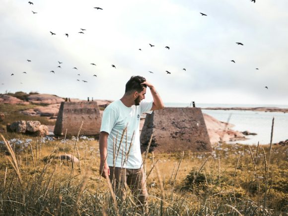 man in white crew-neck t-shirt at daytime