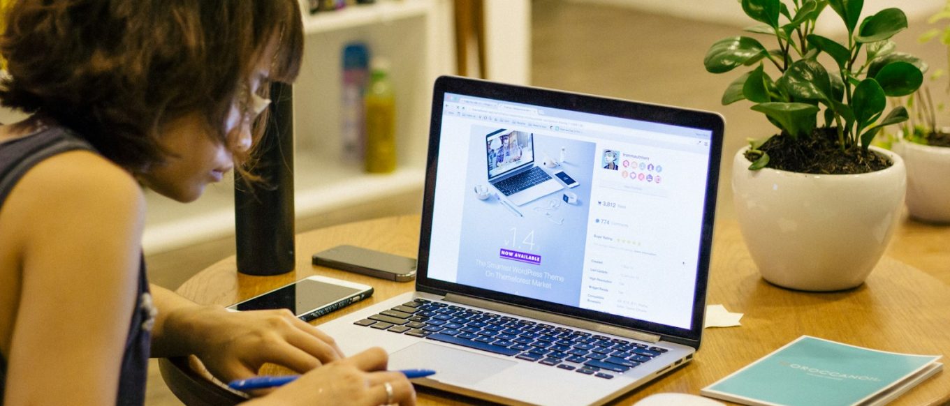 woman browsing on her laptop